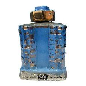 Vintage 1975 Jim Beam
Decanter 7.25" Hyatt
Regency New Orleans Blue Gold Ceramic